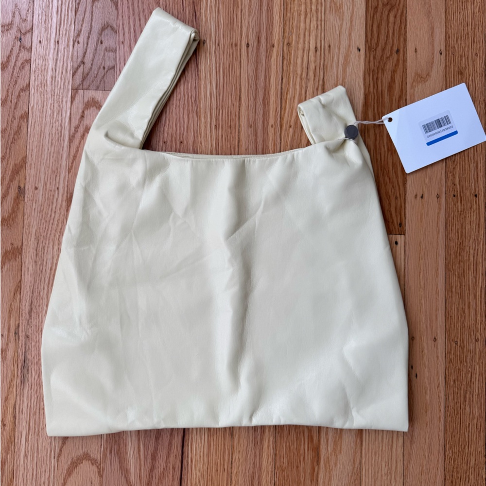 Nanushka butter yellow large clutch